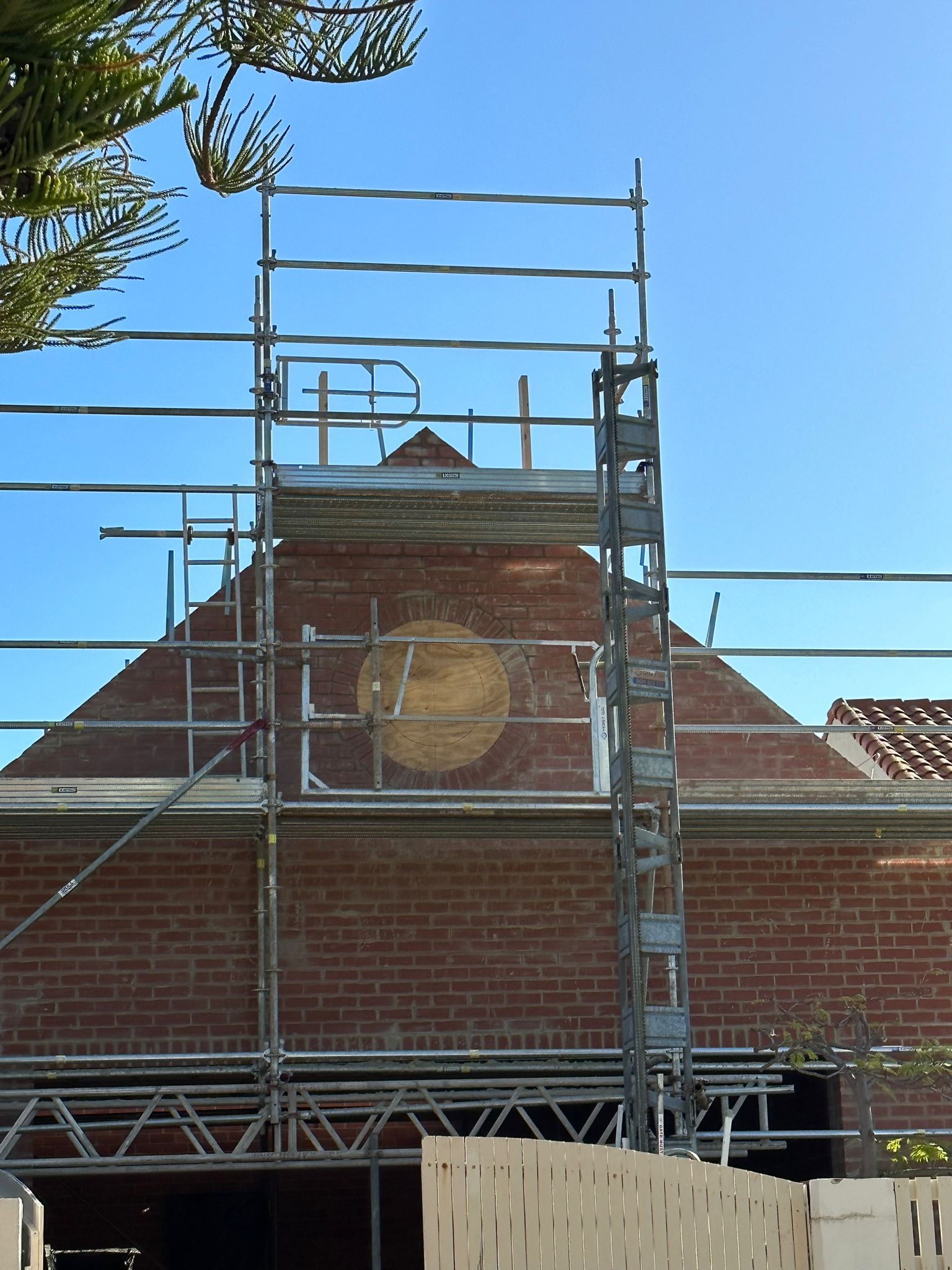 Detailed brickwork formed around the circular window opening, Cottesloe