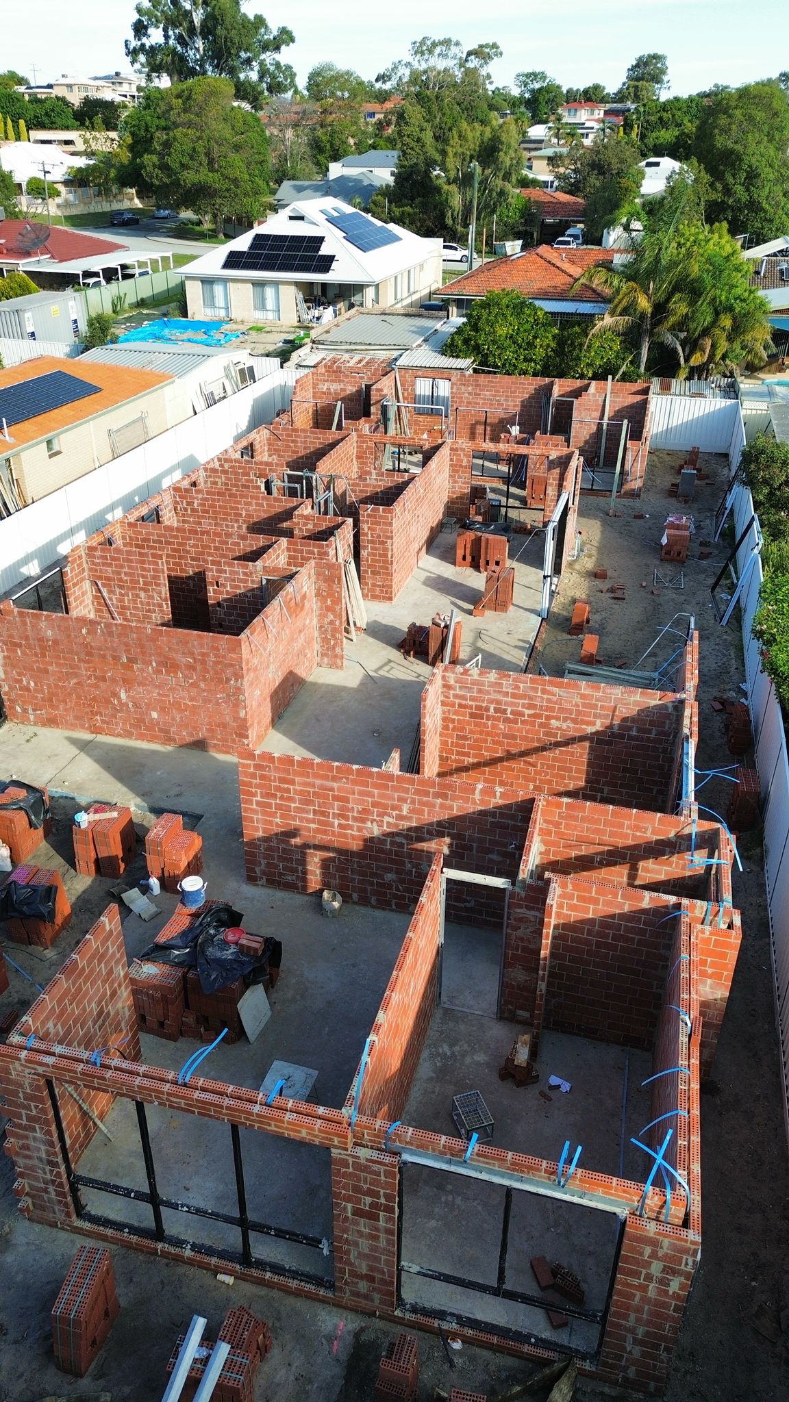 Aerial drone view of Sharp Bricklaying residential new build under construction, Perth WA